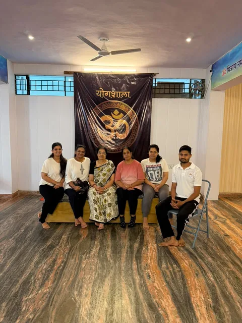 Members of the Yogshala community together in the studio